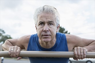 Hispanic man exercising outdoors