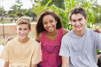 Teenagers smiling together outdoors