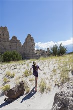 Caucasian girl exploring rock formations
