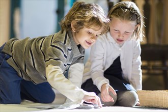 Children working together on floor in classroom