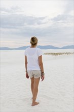 Caucasian woman admiring scenic view of desert