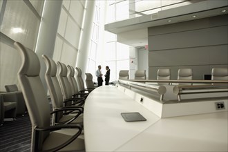 Businesspeople talking in conference room