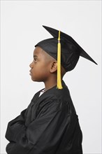 African boy wearing cap and gown