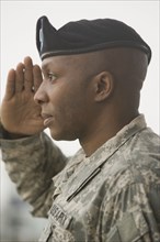 African soldier saluting