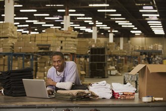 Black man working in warehouse