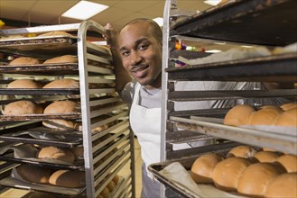 Black baker working in commercial kitchen