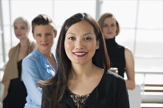 Businesswomen smiling in office