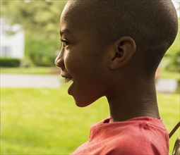 Profile of smiling African American boy