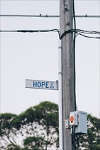 Hope street sign on utility pole