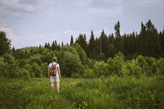Man standing in rural field