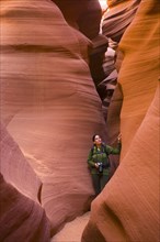 Persian woman hiking in canyon