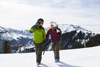 Caucasian couple skiing together