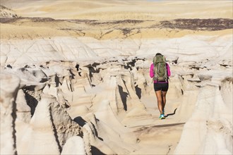 Native American woman hiking in desert