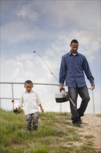 Father and son going fishing together