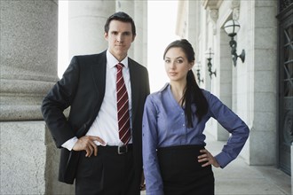Caucasian business people standing outdoors