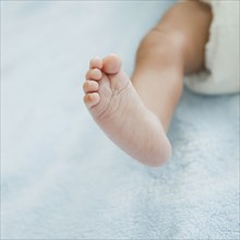 Newborn baby's small foot