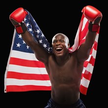 African American boxer holding American flag