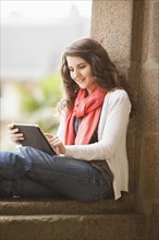 Caucasian woman using digital tablet