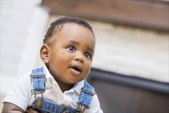 Close up of Black baby boy in living room
