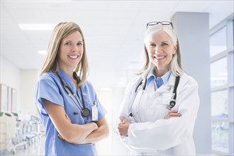 Portrait of smiling Caucasian doctor and nurse