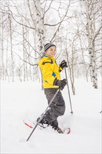 Caucasian boy snowshoeing
