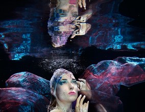 Caucasian woman under water