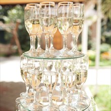 Stack of champagne in champagne flutes