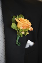 Close up of boutonniere on lapel