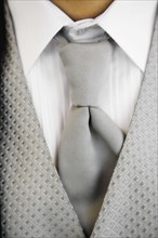 Close up of tuxedo tie and vest