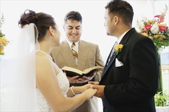 Multi-ethnic couple getting married