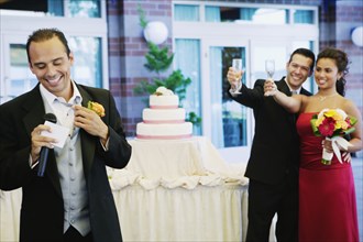 Russian man giving toast at wedding