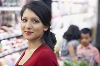 Indian mother in grocery store