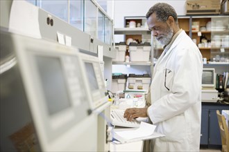 African American scientist working in laboratory