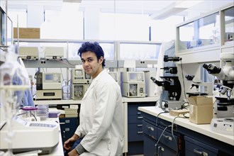 Middle Eastern scientist working in laboratory