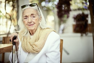 Portrait of smiling older Caucasian woman wearing scarf