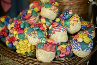 Multicolor trinkets in basket