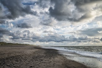 Clouds over ocean beach