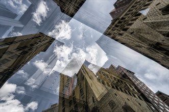 Multiple exposure of highrises under cloudy sky