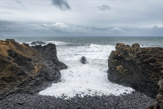 Rocks on beach near ocean