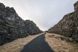 Dirt path between rock formations