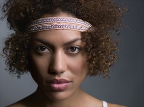 Mixed Race woman wearing headband