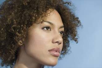 Mixed Race woman with curly hair