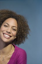 Close up of Mixed Race woman smiling
