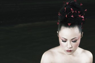 Asian woman with hair up