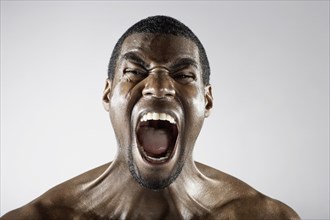 Angry African man shouting