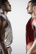 Basketball players standing face to face