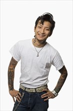 Asian man in rockabilly clothing