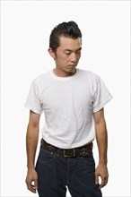 Asian man in rockabilly clothing