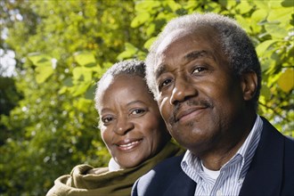 Close up of senior African couple smiling outdoors