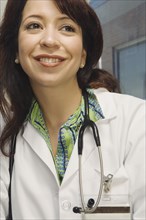Close up of Hispanic female doctor with stethoscope